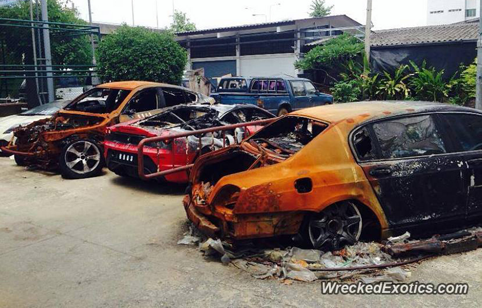 wreckage of exotic cars destroyed by fire at thai auction site image via wrecked exotics_100471689_h