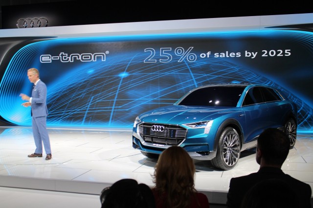 Audi of America president Scott Keogh with Audi e-Tron Quattro Concept, 2015 Los Angeles Auto Show
