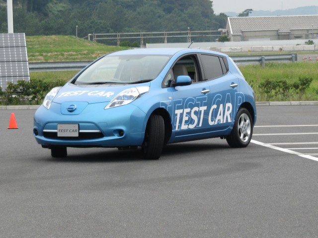 Nissan Leaf with automatic parking location to position over a wireless charging pad, Oppama, Japan