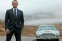 Daniel Craig as James Bond, Agent 007, in Skyfall, with Aston Martin DB5