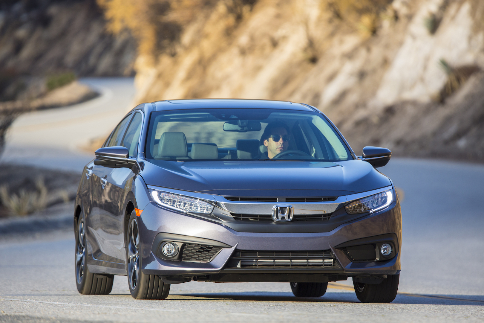 Honda Civic, Scion iA Drives; Tesla Reliability; Nissan Electric Aims