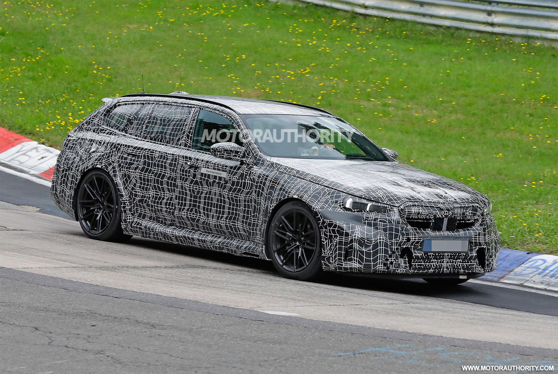 2025 BMW M5 Touring spy photographs Motocourt