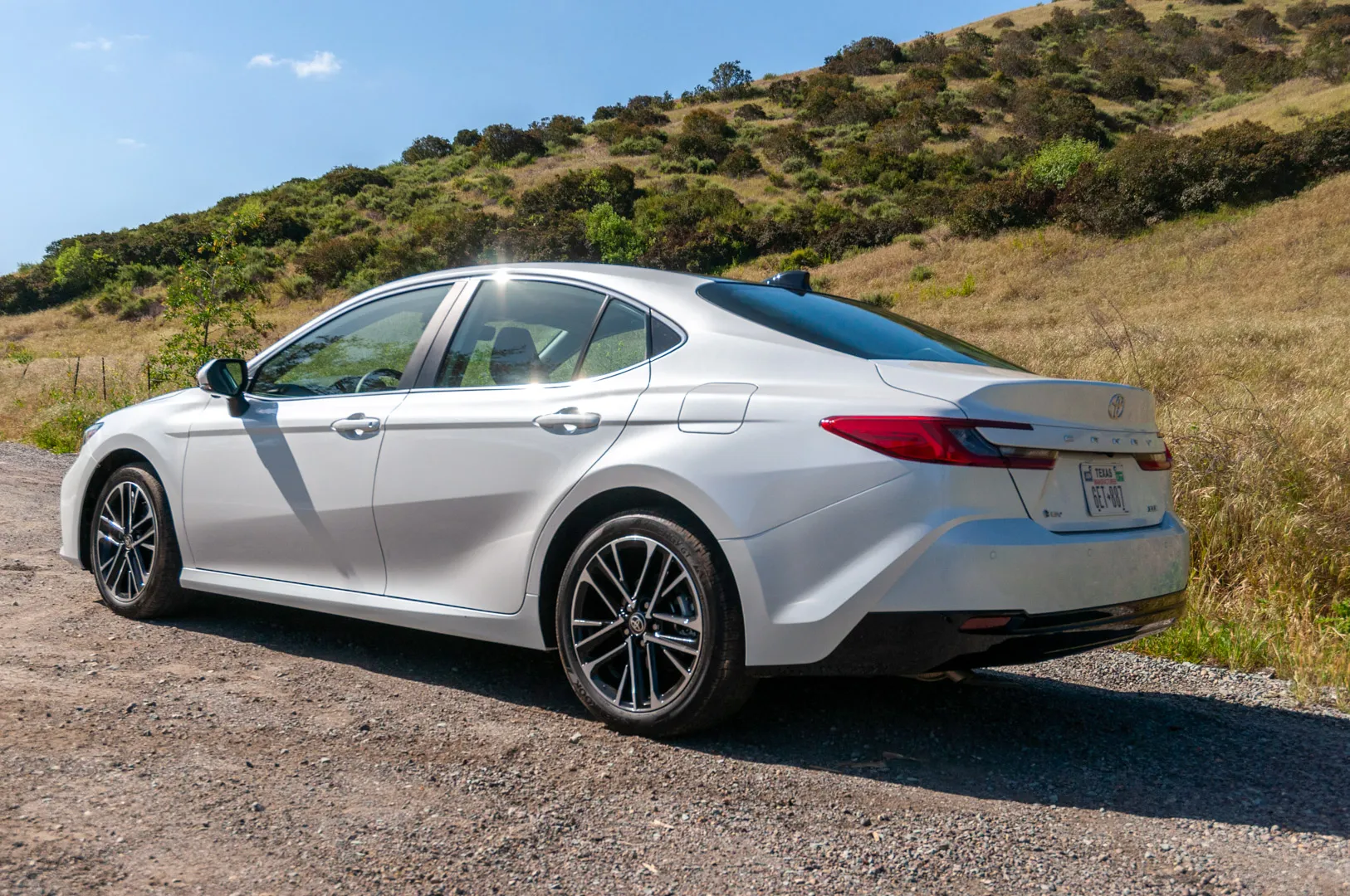 2025 Toyota Camry front grille and fascia detail with precision mesh and chrome lower accent