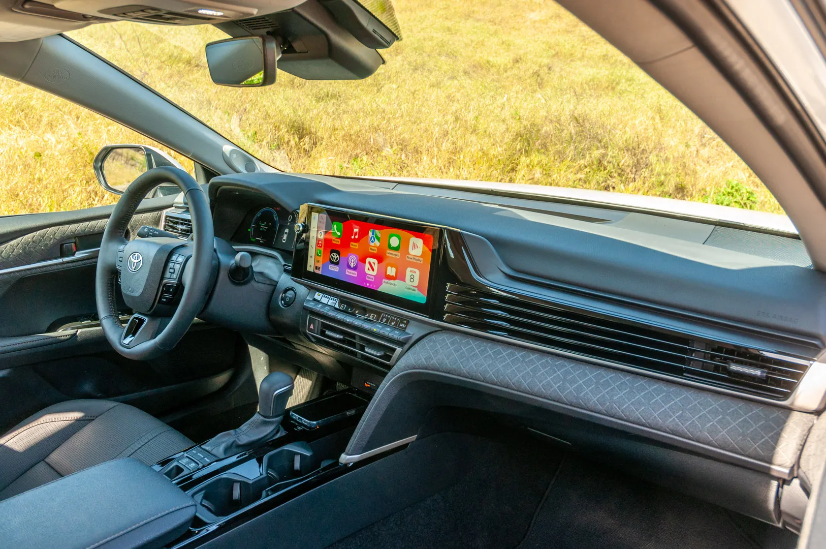 2025 Toyota Camry XSE interior dashboard overview with soft-touch surfaces and 12.3-inch touchscreen