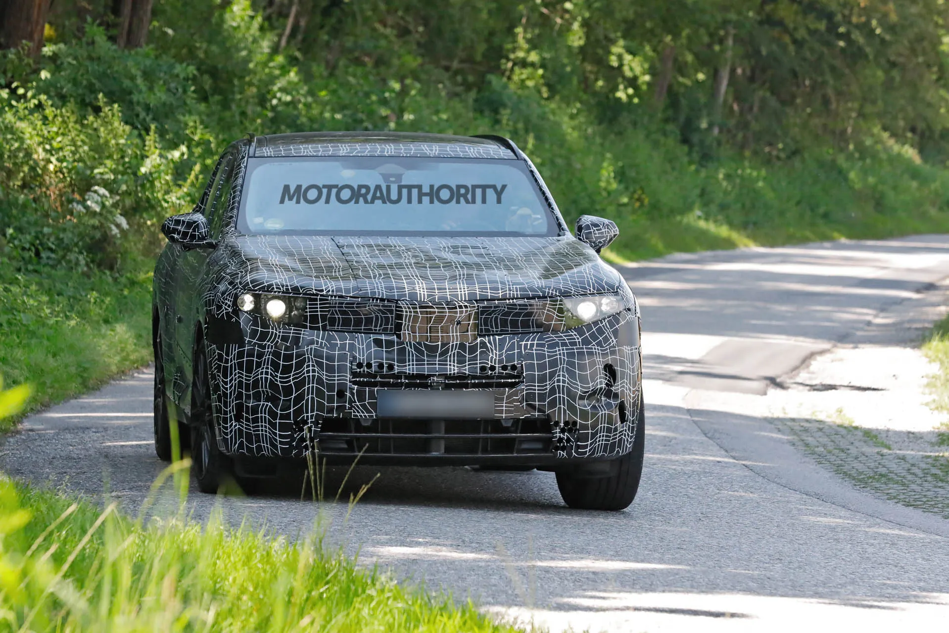 2026 BMW X6 spy shots - Photo credit: Baldauf