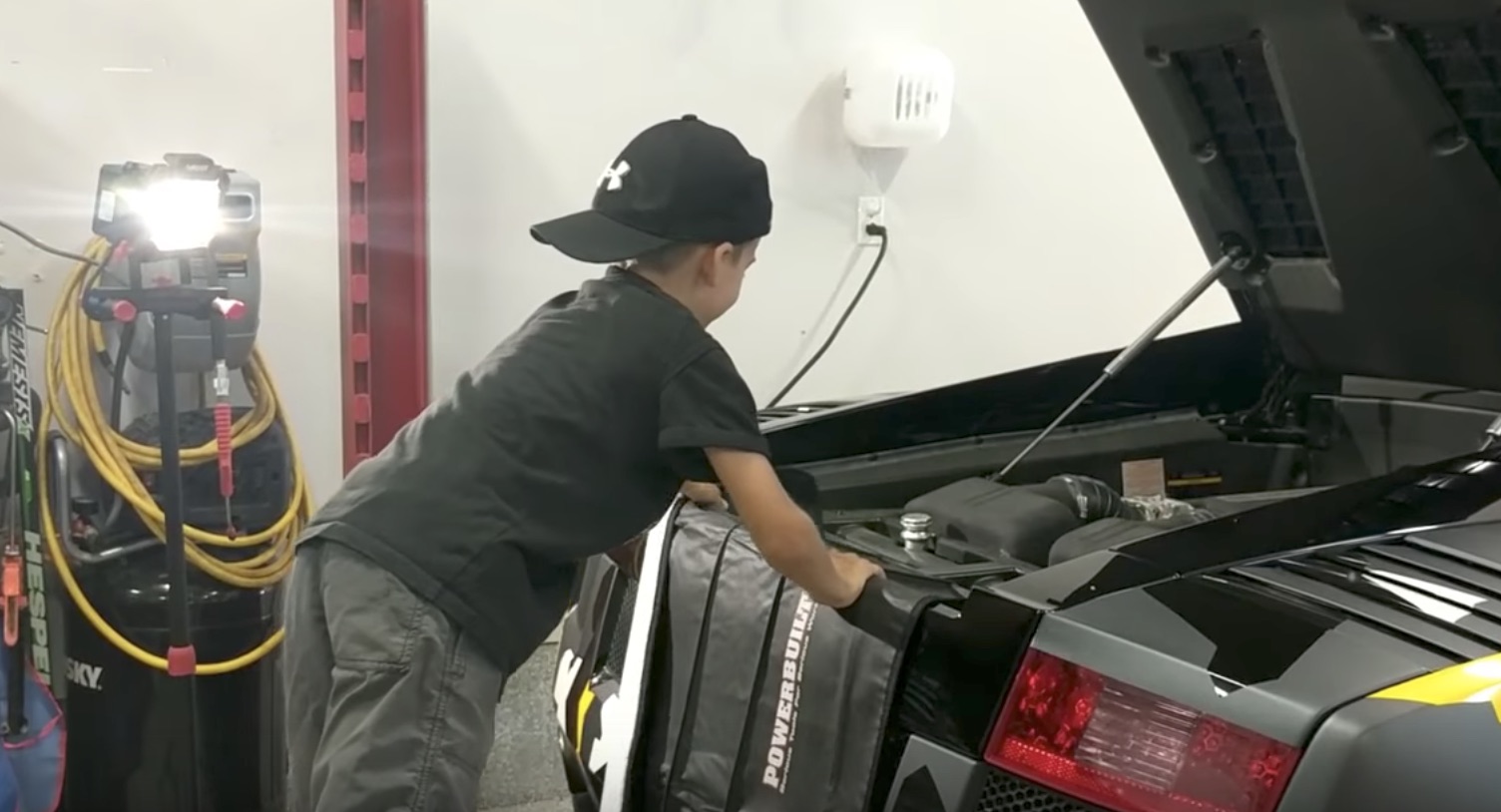 5-year old shows you how to change the oil in a Lamborghini