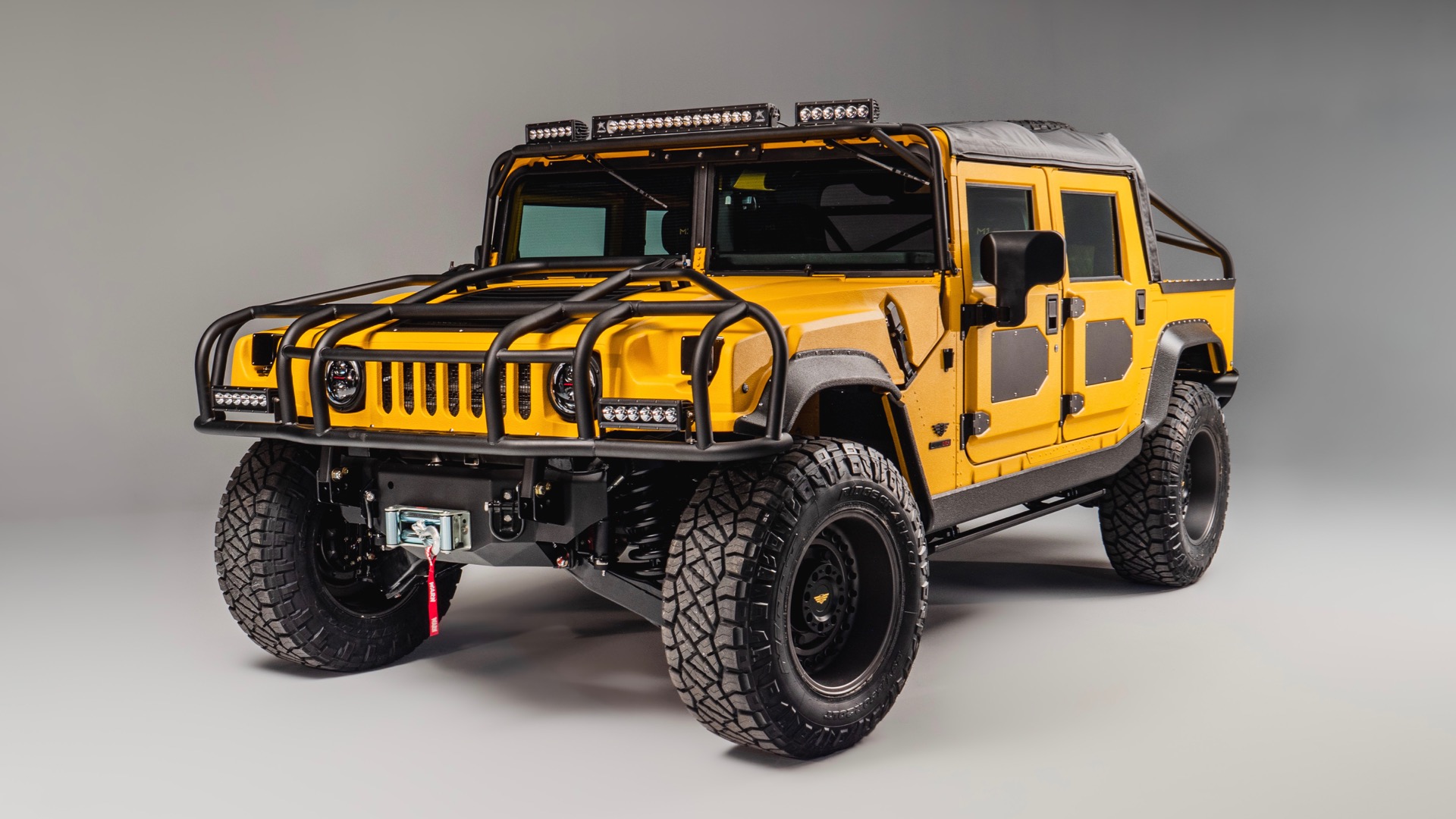 Bright yellow Mil-Spec M1-R is an 800-hp go-anywhere, look-at-me off-road Hummer  H1