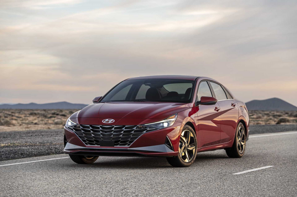 2021 Hyundai Elantra unveiled, Valkyrie hits the road, Elantra Hybrid targets 50 mpg: What's New @ The Car Connection lead image