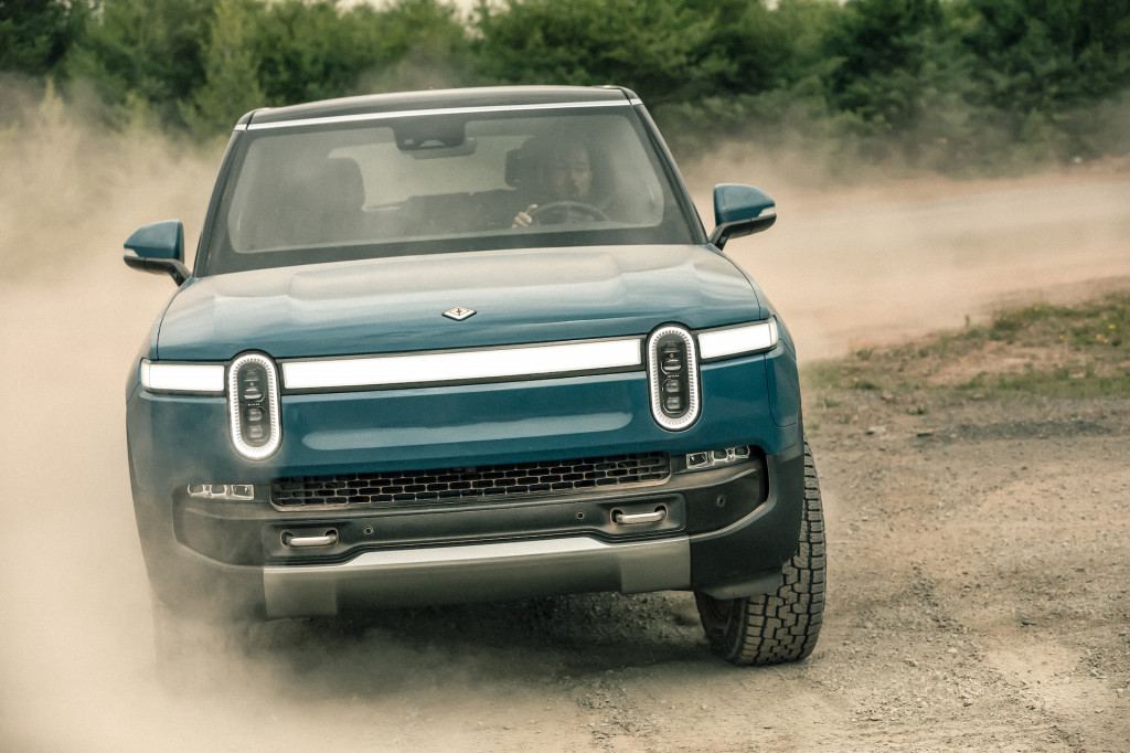 Rivian is putting charging stations at trailheads so owners can go on adventures.