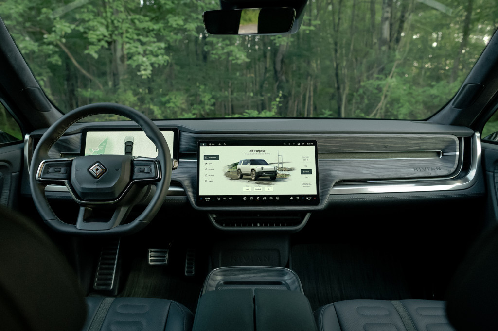 Rivian outfits the R1S's cabin with sustainable materials, plenty of technology, and some cool extras.