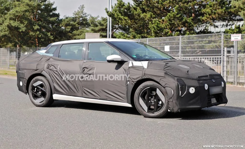 2026 Kia EV4 liftback spy shots - Photo via Baldauf