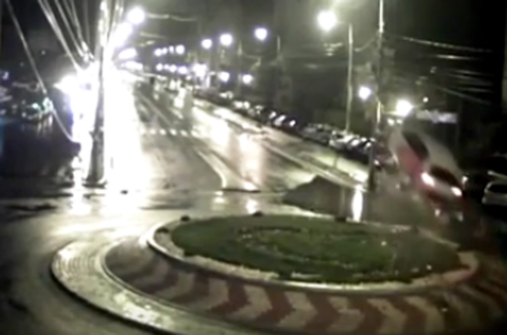 Car flies through roundabout after driver falls asleep at wheel