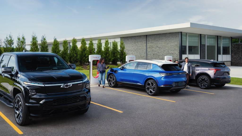 Chevrolet EVs at a Tesla Supercharger station