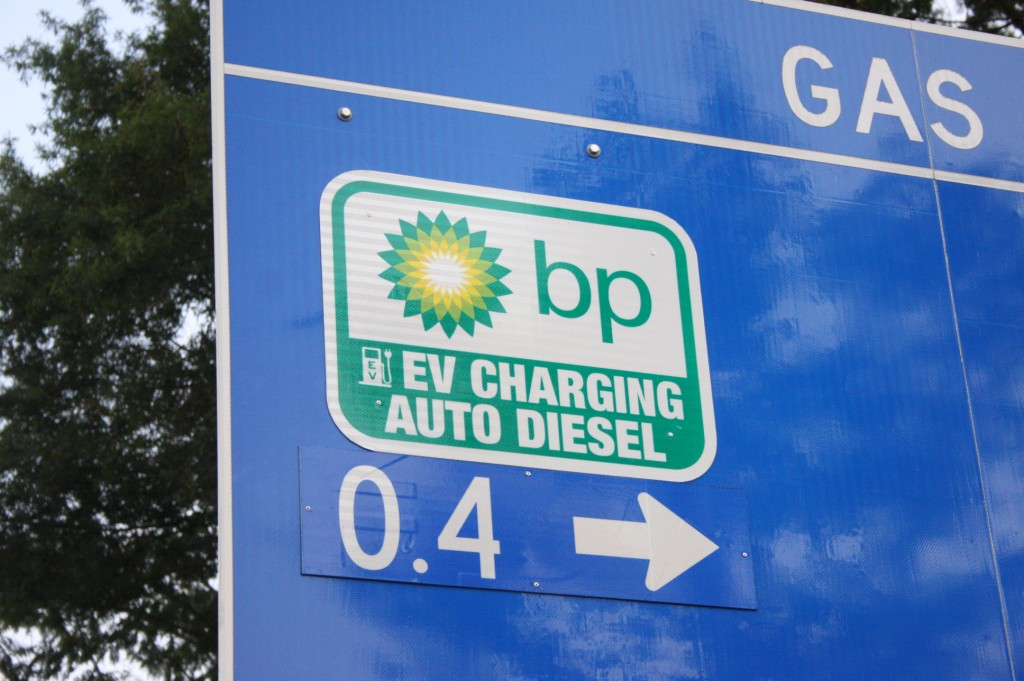 Highway sign for electric-car fast-charging station at BP in Metrolina area of Charlotte, NC