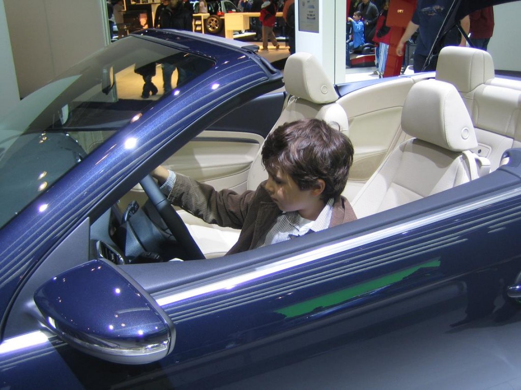 Luc at the NY Auto Show behind the wheel of a 2009 Volkswagen Eos