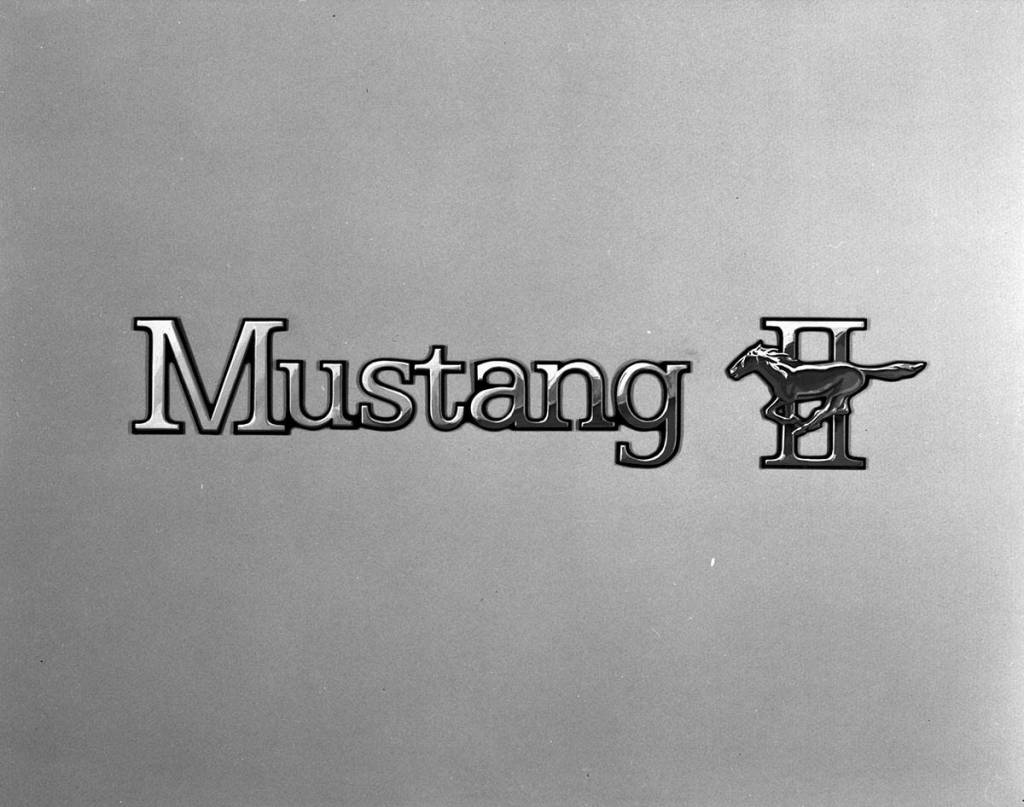 When the Mustang II arrived for the 1974 model year, the tri-bar fender badge was reworked to a Roman numeral II and the horse was re-sculpted with its head more upright and a straighter tail. (Courtesy of Ford Motor Company)