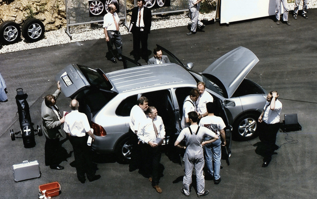 Porsche board members inspect a first-generation Cayenne prototype in June 2000