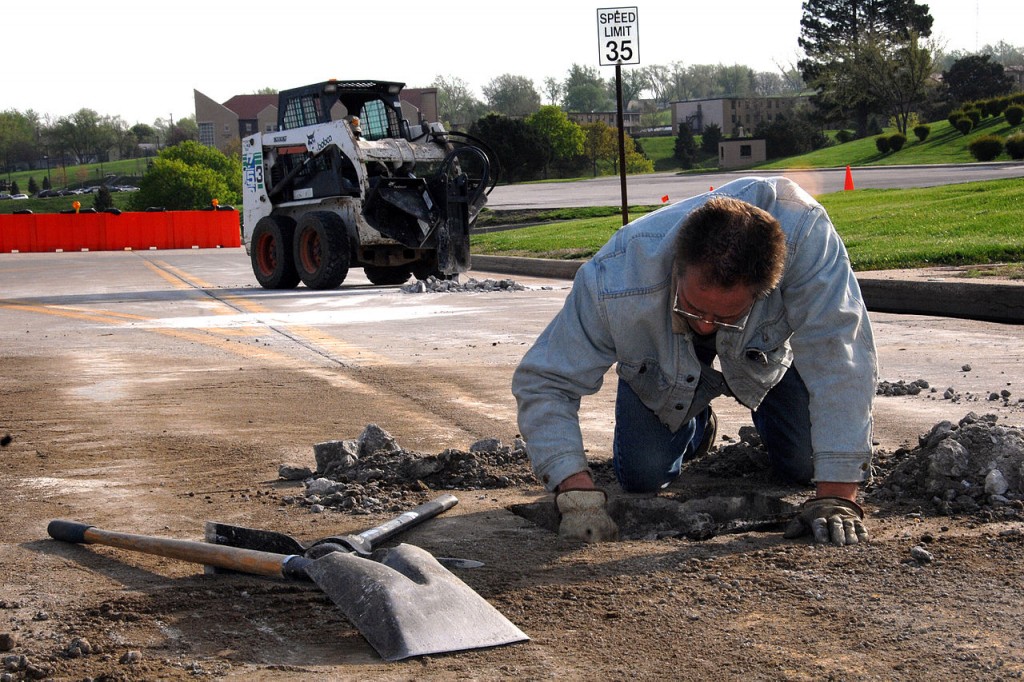 Pothole repair (via Wikimedia)