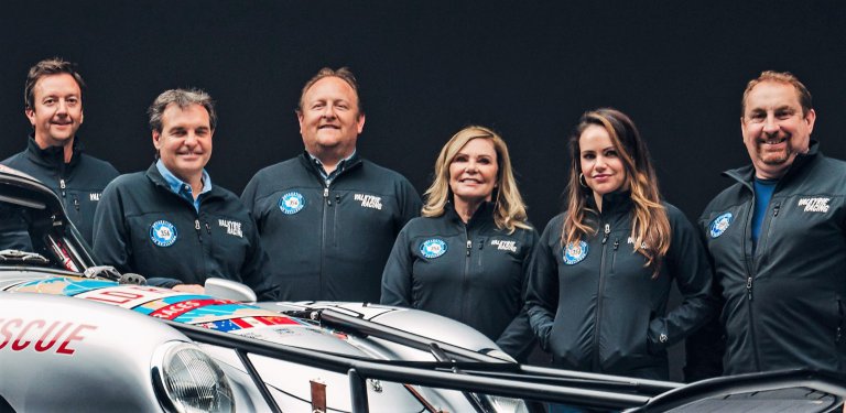 Renee Brinkerhoff (center) with her daughter and other members of the Valkyrie racing team |