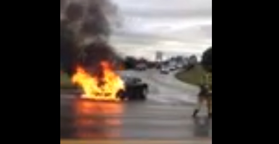 Tesla Model S in flames near Kent, Washington [frame from YouTube video]