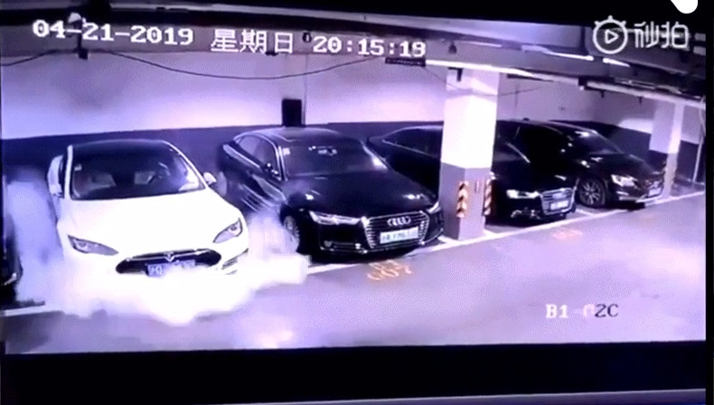 Tesla reportedlly catching fire in Shanghai parking garage [Video screen grab]