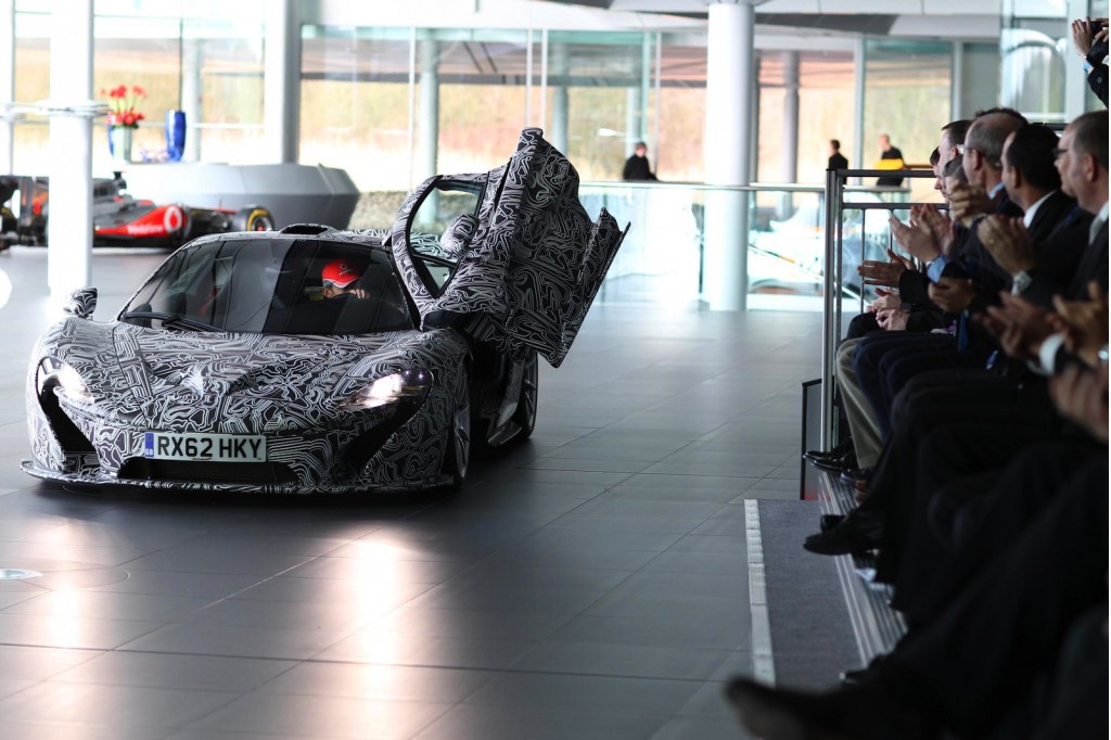 The upcoming McLaren P1 makes a cameo at the MP4-28 reveal