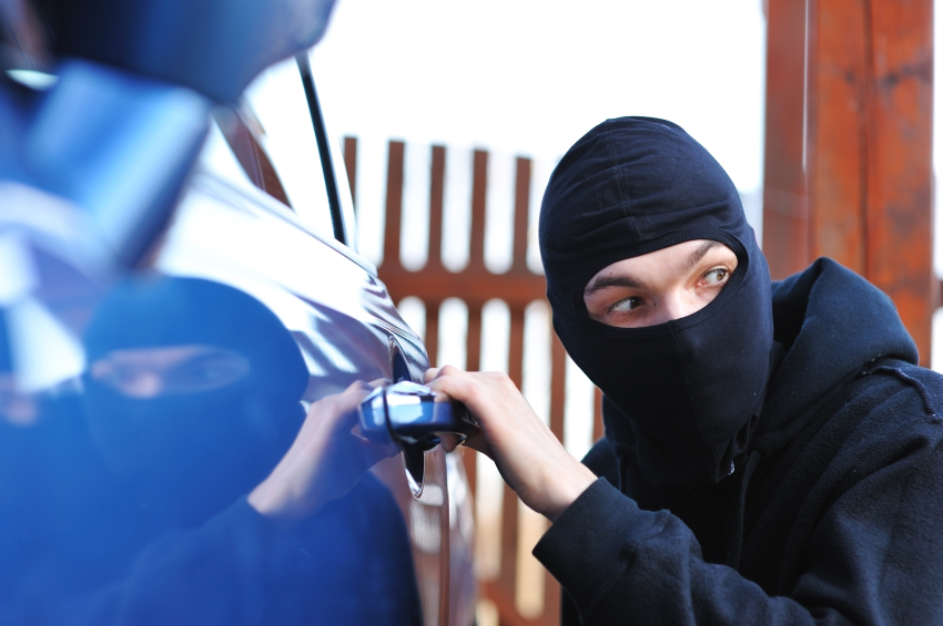 Thief Stealing a Car