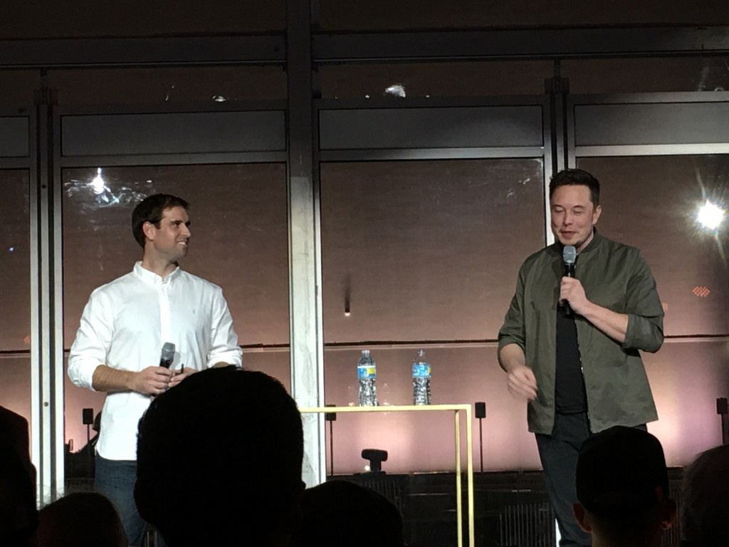Tesla CTO JB Straubel and CEO Elon Musk presenting at gigafactory tour, Reno, Nevada, July 2016