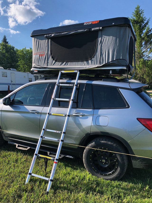 2019 Honda Passport with RoofNest tent for camping
