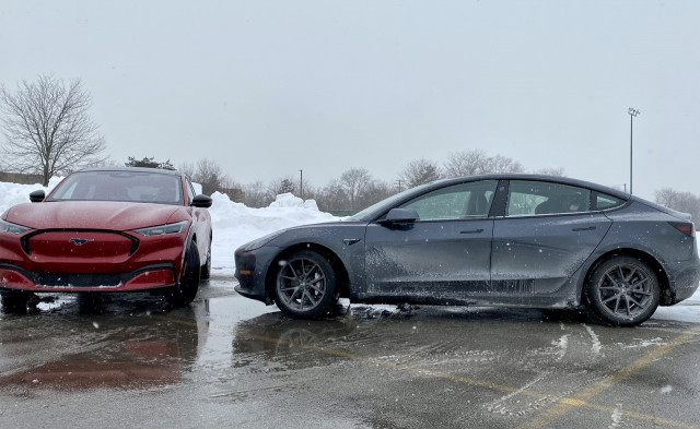 2021 Ford Mustang Mach-E, left, and 2021 Tesla Model 3, right
