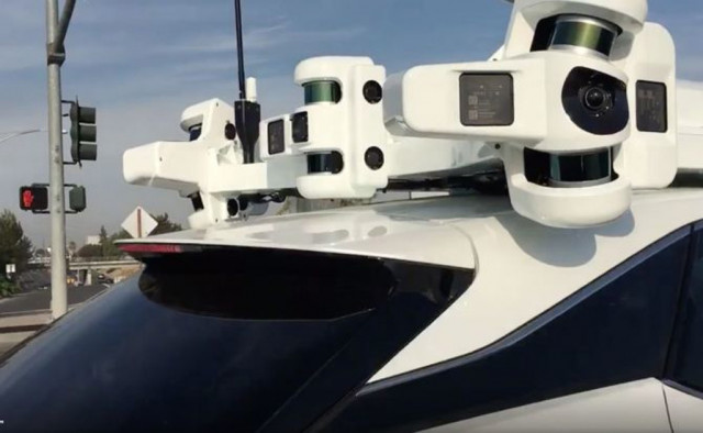 Apple’s self-driving system atop a Lexus RX - Image via MacCallister Higgins