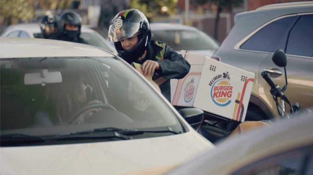 Have it your way: Burger King delivers Whoppers via motorcycle to cars stuck in traffic