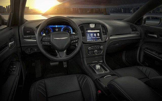 A leather-wrapped dashboard and Laguna black leather seats are standard inside the 2023 Chrysler 300C
