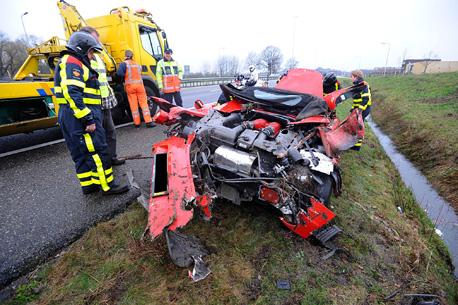 Father and son survive Ferrari F430 crash