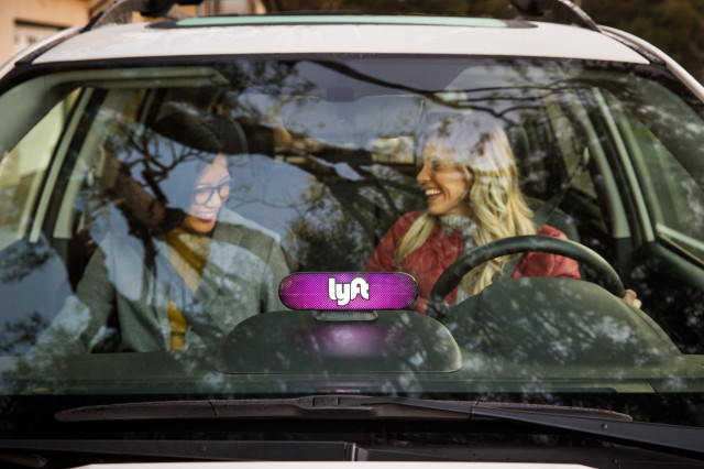 Lyft car picking up a rider