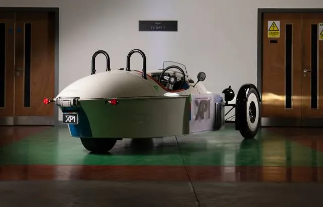 Morgan electric 3-wheel sports car chases Aptera, open-air style