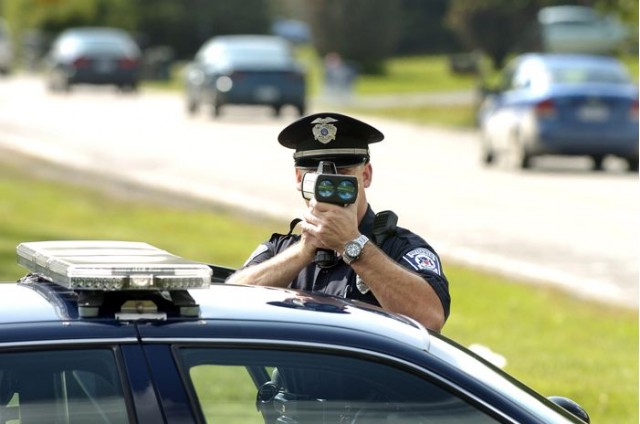 Officer with speed gun