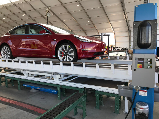 Tesla Model 3 all-wheel drive Performance rolls off a new assembly line in a temporary structure