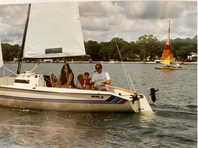 Unc flying a hull with his Hobie 16––Unc, Aunt Jan, Hannah Feder, and Joel Feder in the Holder 17 sailboat