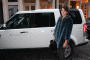 Alexa Chung poses with a 2011 Land Rover LR4