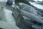 BMW 1-Series with snow chains on front wheels, Staffordshire, England, Dec 2010, photo by Andy Smith
