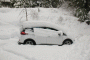 2017 Chevrolet Bolt EV electric car after snowfall, Glacier National Park [photo: D Gadotti]
