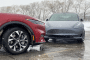 2021 Ford Mustang Mach-E, left, and 2021 Tesla Model 3, right