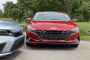 2022 Honda Civic Touring, blue, and 2021 Hyundai Elantra SEL, red