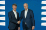 BMW Group CEO Harald Krüger (left) and Daimler CEO Dieter Zetsche