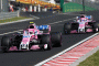 Force India's Esteban Ocon and Sergio Perez at the 2018 Formula 1 Hungarian Grand Prix