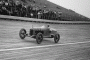 Pete DePaolo races on a race track comprised of wooden planks in 1925
