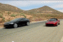 Tesla all-electric Model S sedan and Roadster sports car shown together on video