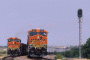 Two BNSF locomotives hauling coal trains meet near Wichita Falls, Texas